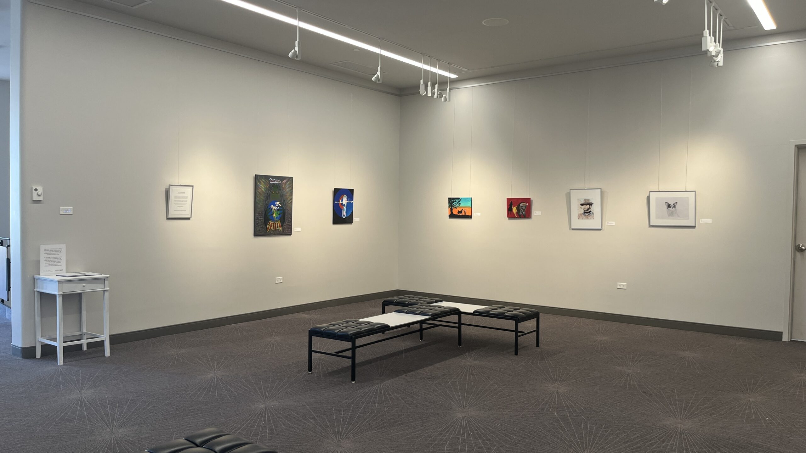 Image of artwork hanging on the walls of the Joan Waterfield Gallery